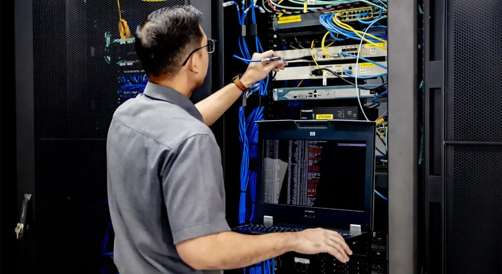 IT professional from PUNCAK AI managing server infrastructure for AI Governance Suite