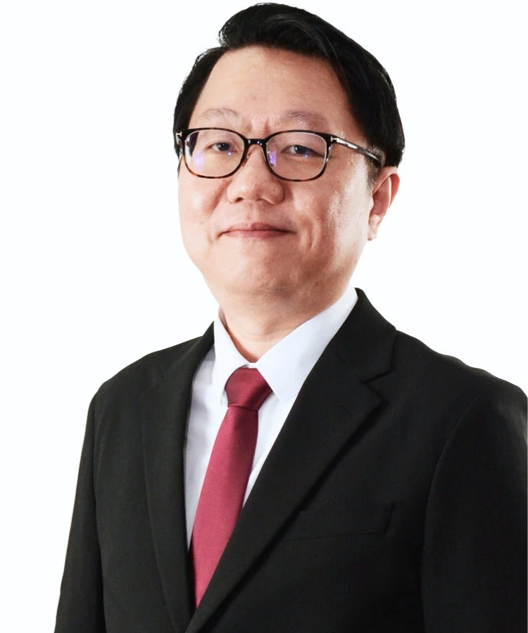 Mr Tan, Software Architect at Puncak AI, professional headshot